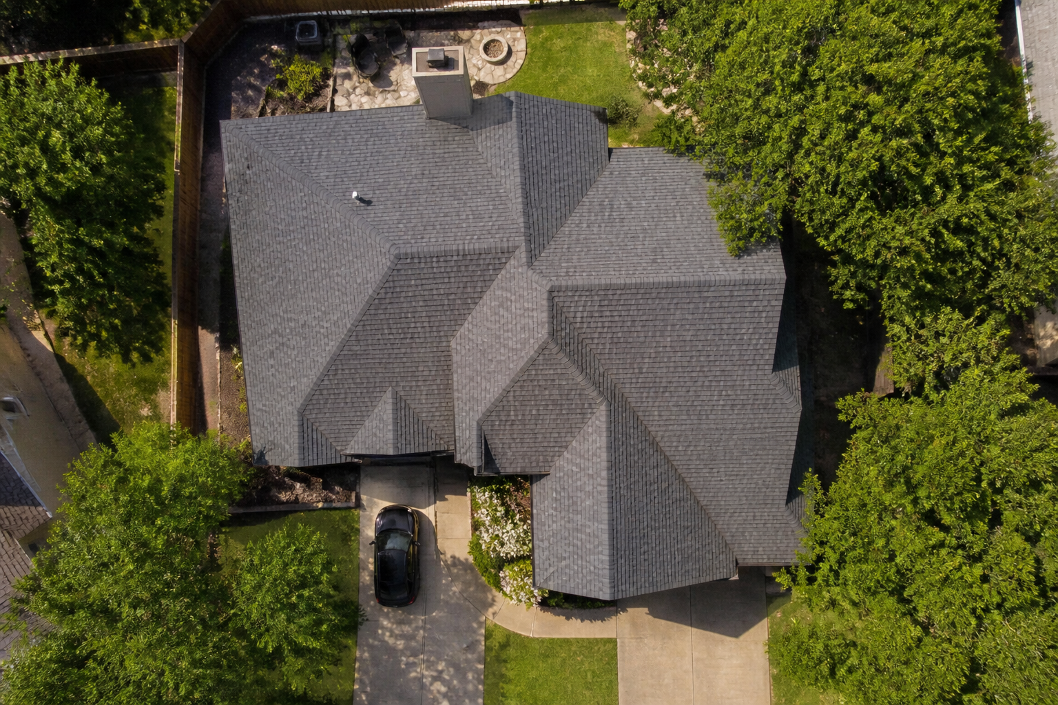 Aerial view of a completed roof replacement in Central Texas